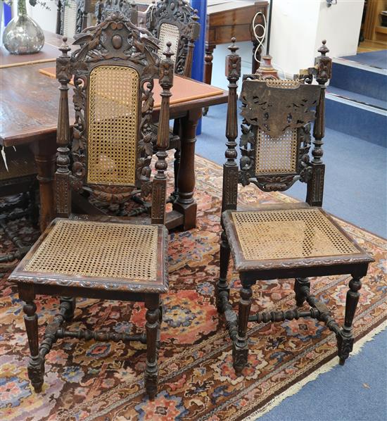 A set of six Victorian carved oak Carolean style dining chairs and two similar chairs